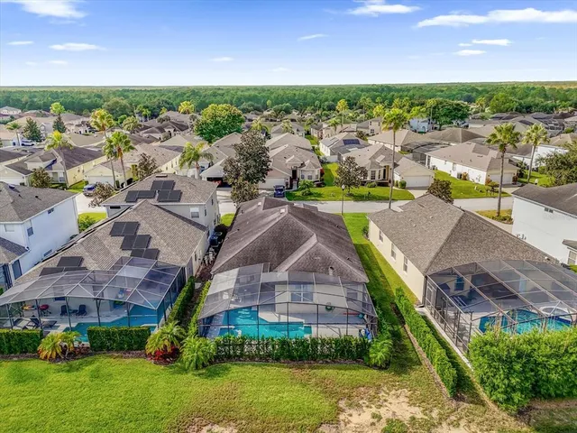 an aerial view of a house with a garden