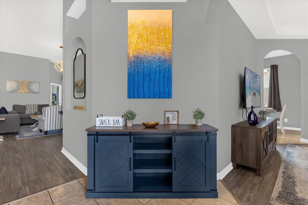 246 Montara Drive Davenport, FL 33897 - Photo 4 of 37 a view of hall way with furniture and mirror