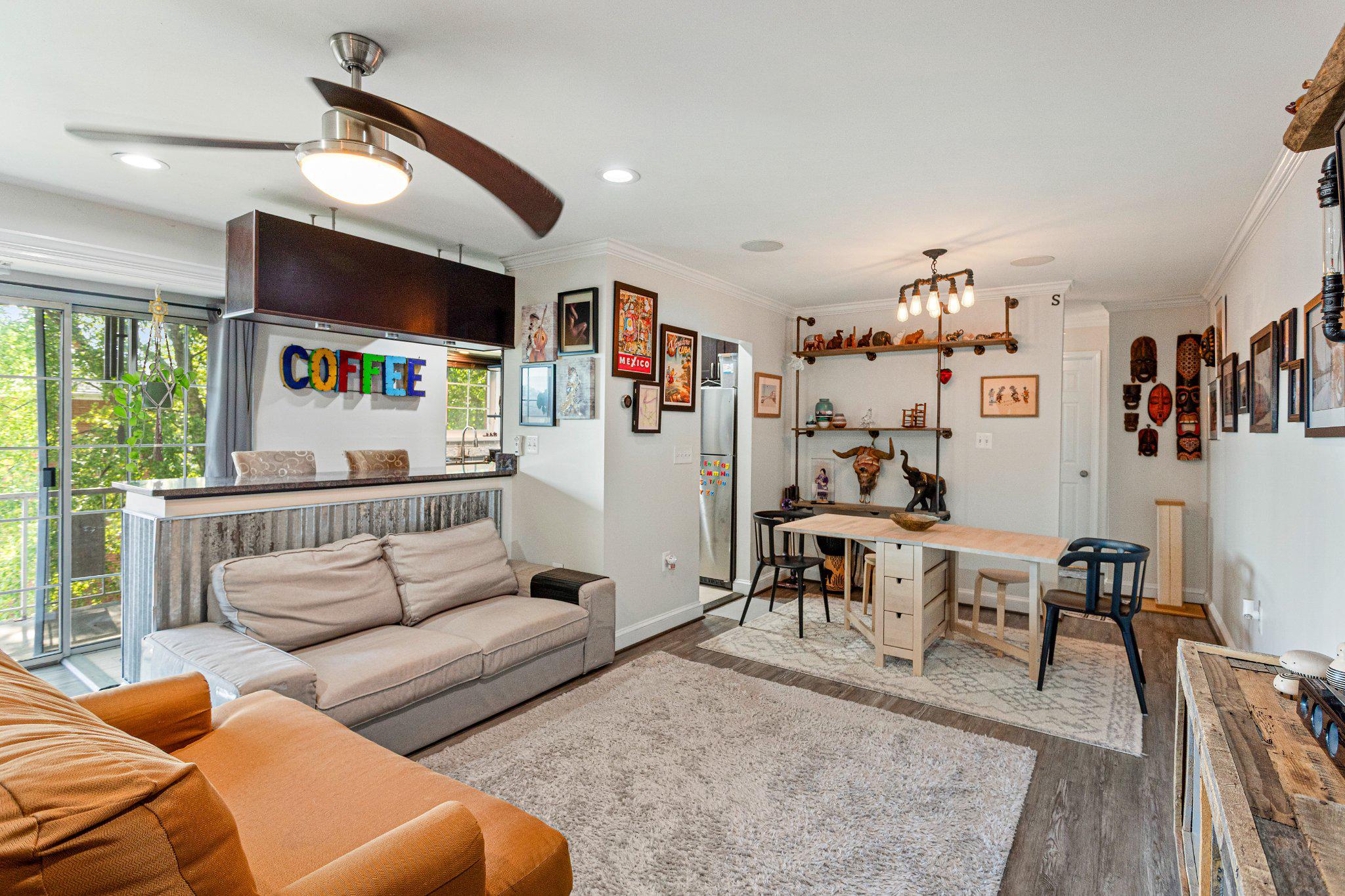 5613 Franconia Road, Unit 303 Alexandria, VA 22310 - Photo 5 of 27 a living room with furniture and wooden floor
