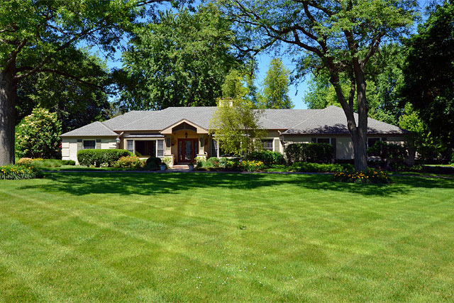 833 North Inverway Road Inverness, IL 60067 - Photo 1 of 25 a front view of house with yard and green space