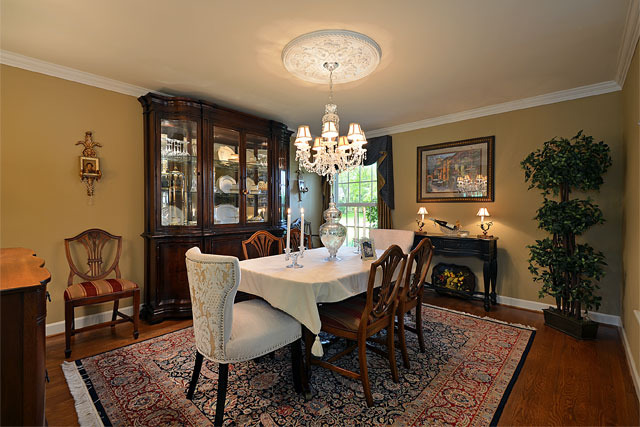 833 North Inverway Road Inverness, IL 60067 - Photo 12 of 25 a view of a dining room with furniture window and wooden floor