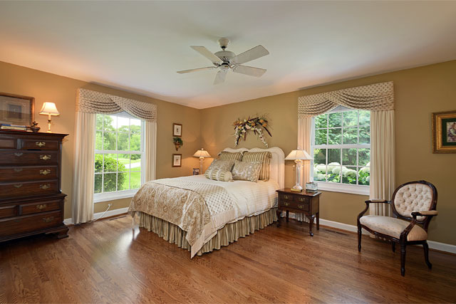 833 North Inverway Road Inverness, IL 60067 - Photo 17 of 25 a bed room with a bed window and a chair