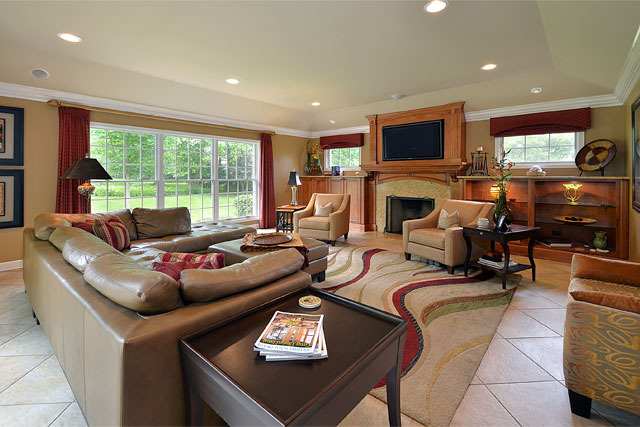 833 North Inverway Road Inverness, IL 60067 - Photo 7 of 25 a living room with furniture a large window and a fireplace