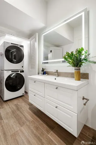 a bedroom with a bed and a cabinets