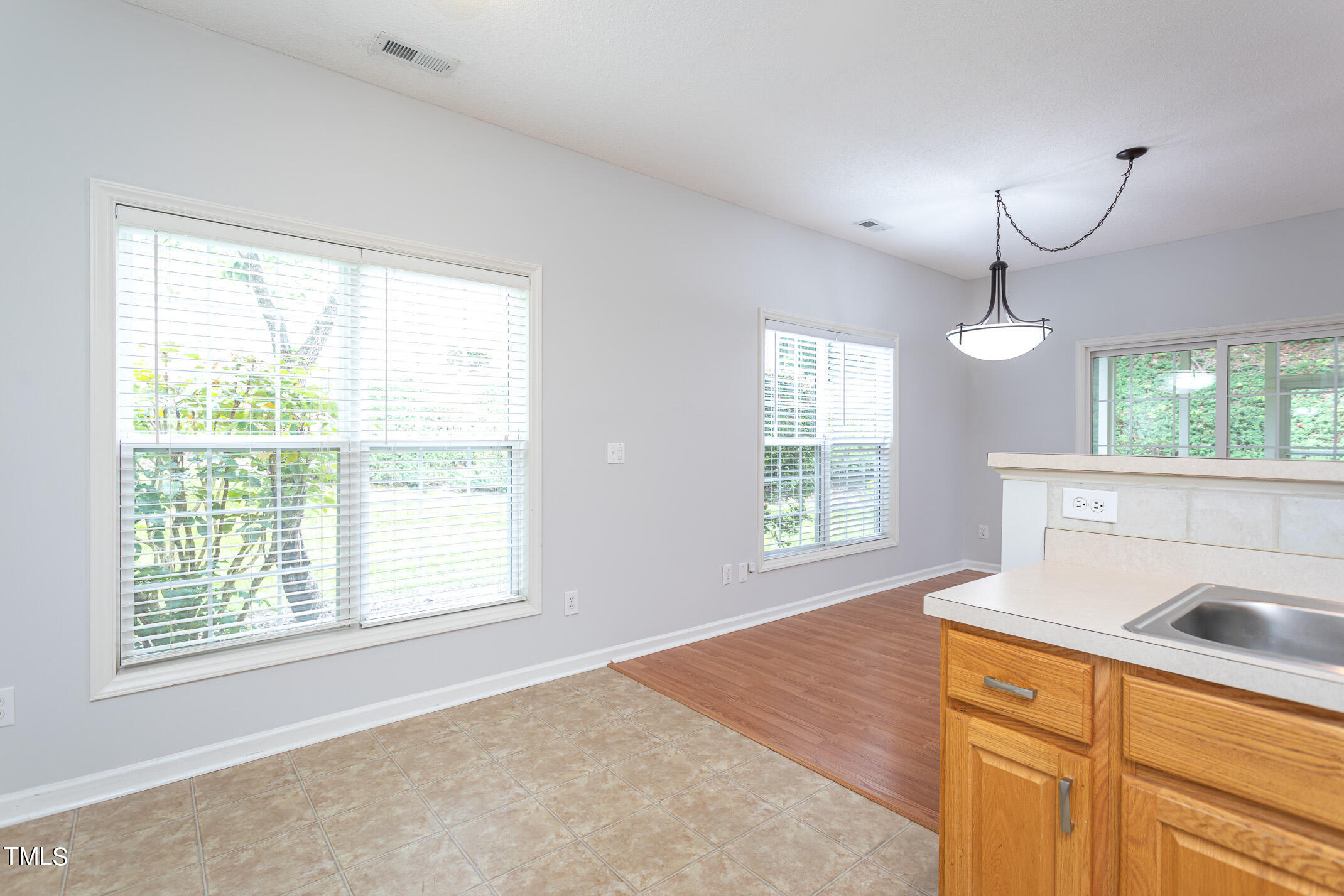 2548 Bent Green Street Raleigh, NC 27614 - Photo 15 of 28 a bedroom with a bed and a window