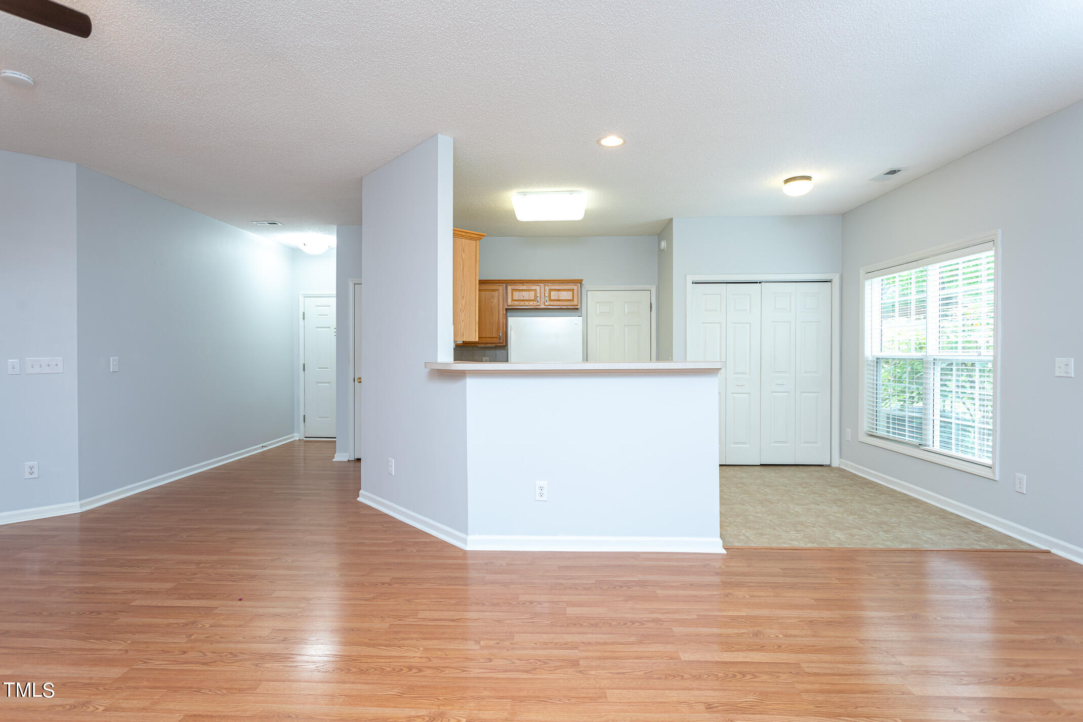 2548 Bent Green Street Raleigh, NC 27614 - Photo 16 of 28 a view of a big room with wooden floor and windows