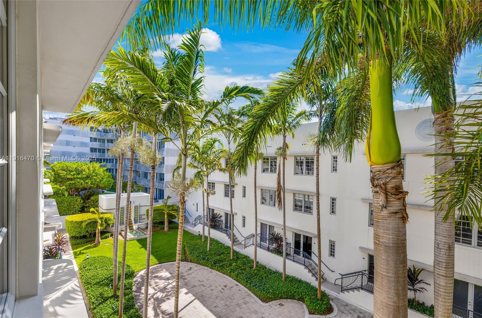 435 21st Street, Unit 311 Miami Beach, FL 33139 - Photo 2 of 40 a view of a backyard with plants