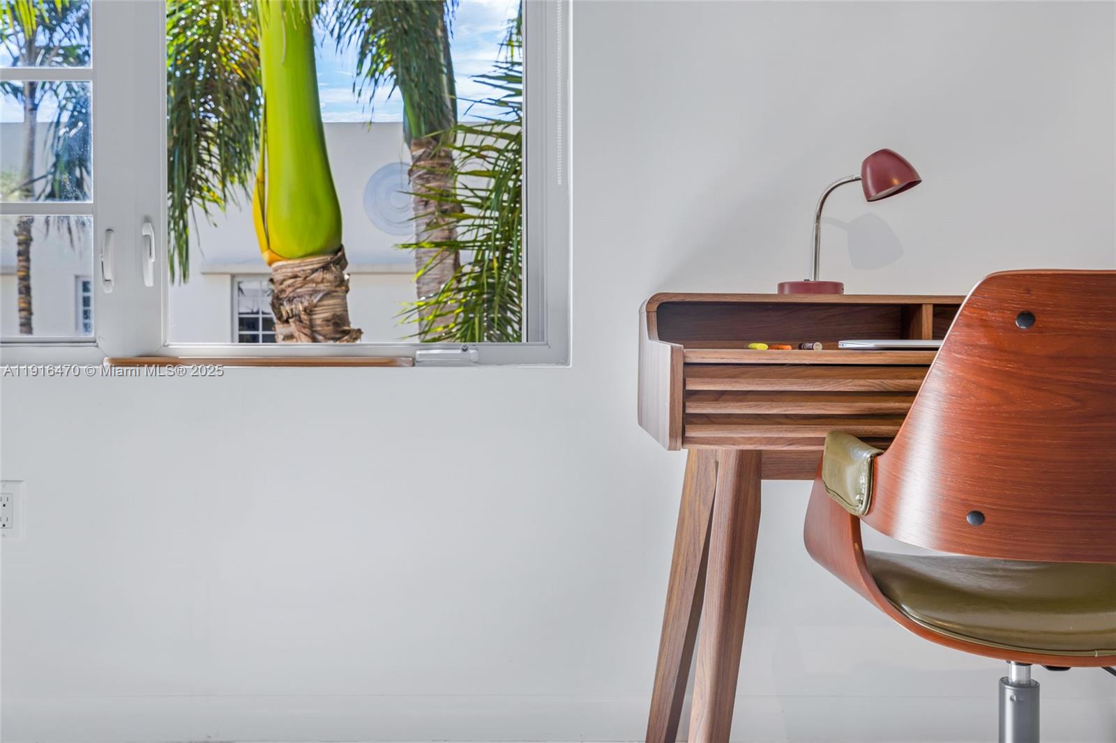 435 21st Street, Unit 311 Miami Beach, FL 33139 - Photo 23 of 40 closeup of a bathroom with a sink and a mirror