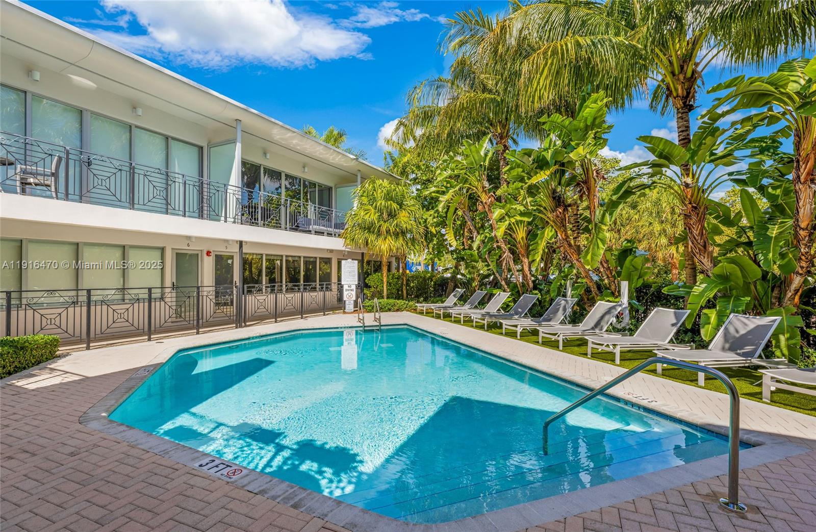435 21st Street, Unit 311 Miami Beach, FL 33139 - Photo 3 of 40 a view of a house with pool