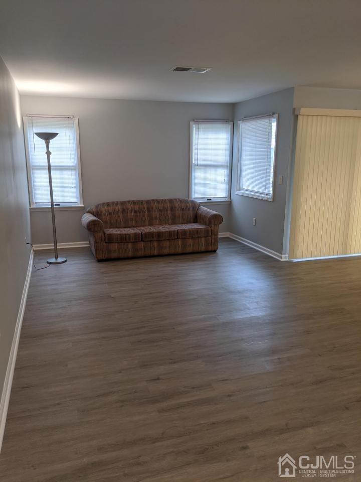 610 Edpas Road New Brunswick, NJ 08901 - Photo 2 of 2 a view of a room with wooden floor and window