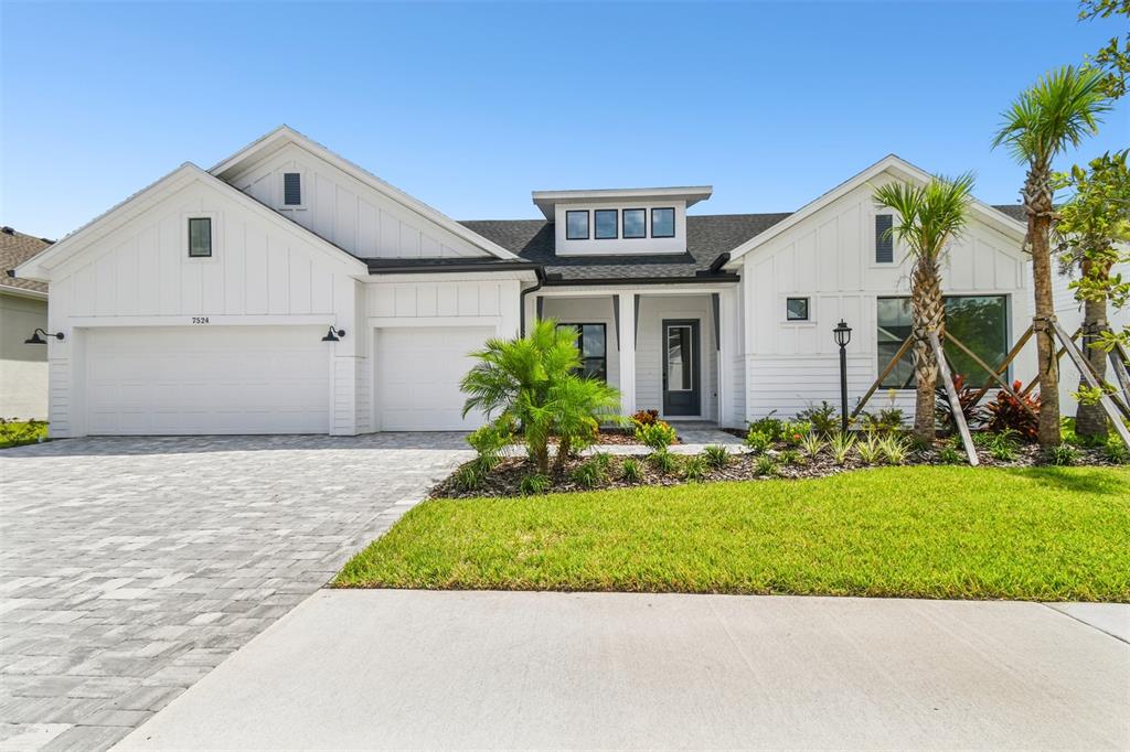 7524 Ashbrooke Pine Loop Odessa, FL 33556 - Photo 1 of 1 a front view of house with yard