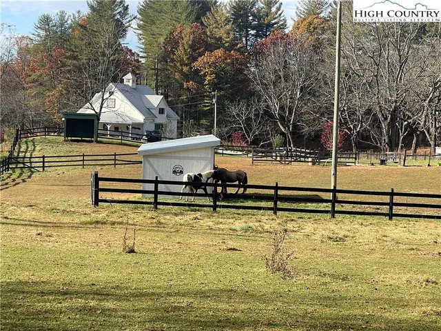 a view of a swimming pool with a chair