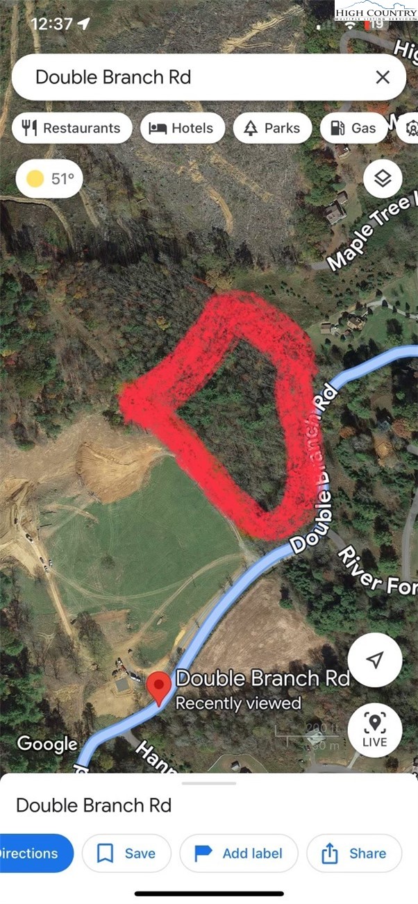 Lot 20 Double Branch Road Grassy Creek, NC 28631 - Photo 10 of 13 a picture of a book in the background