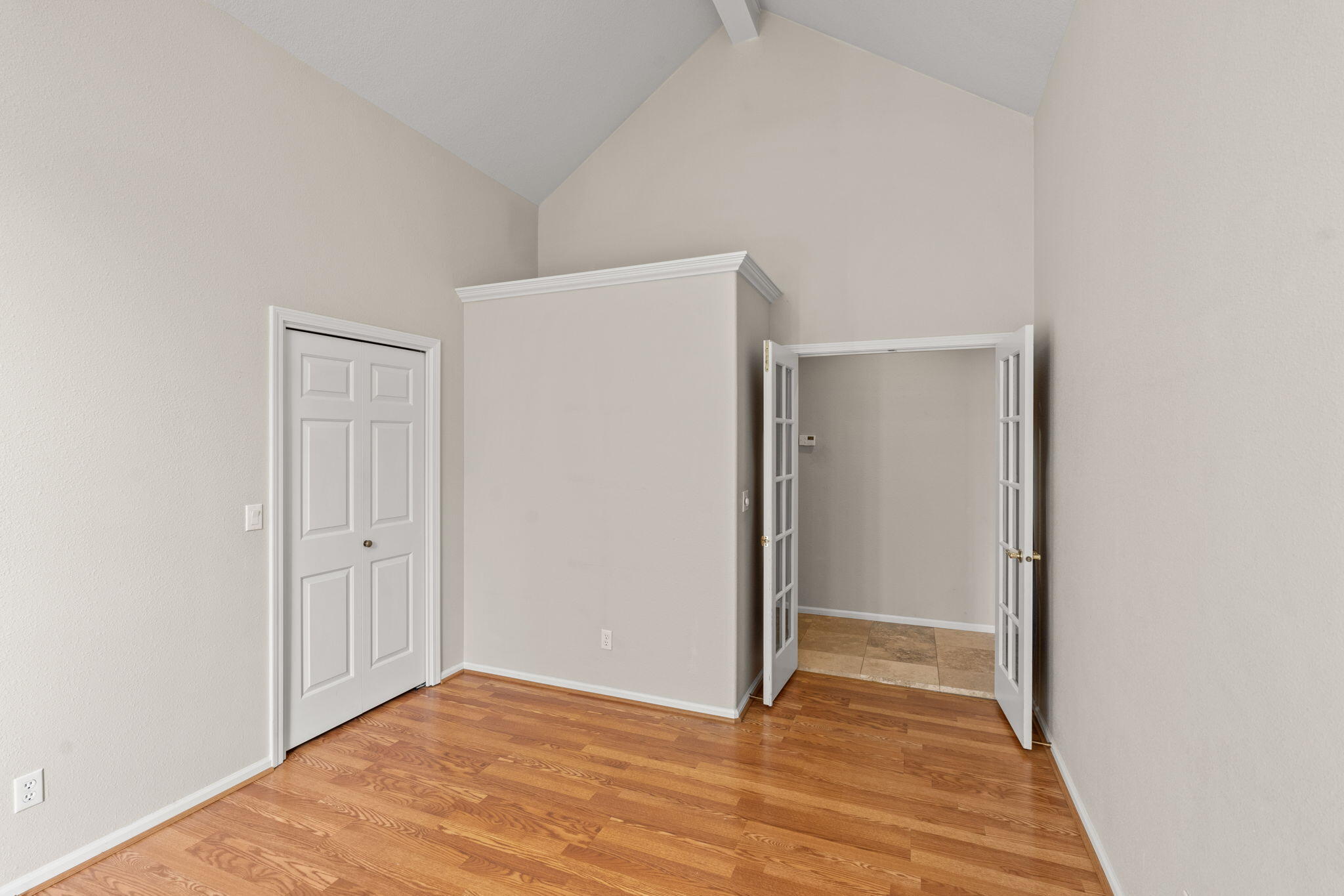 61504 Southeast Hill Ridge Road Bend, OR 97702 - Photo 40 of 70 a view of an empty room with wooden floor