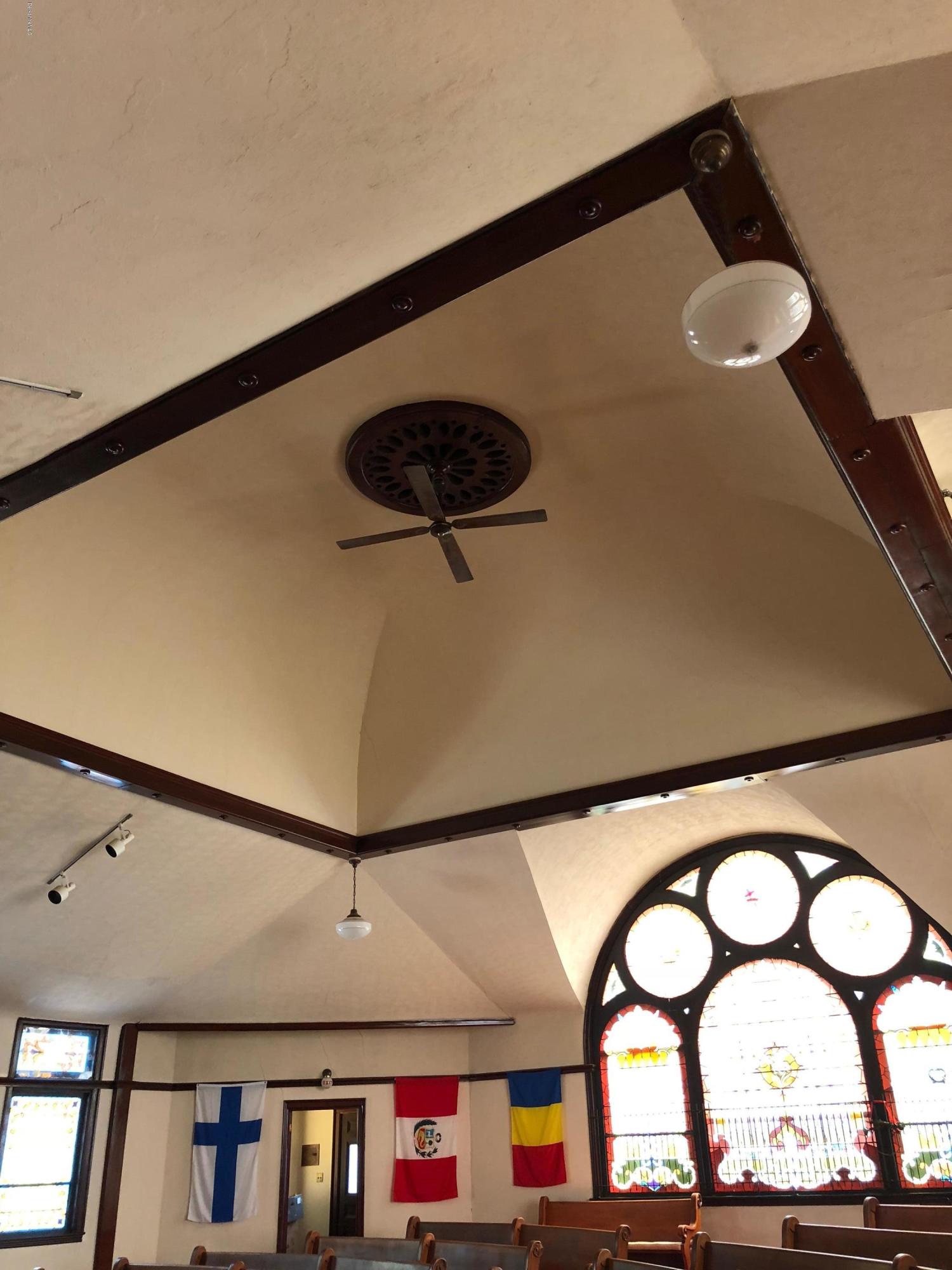 160 High Street Lee, MA 01238 - Photo 16 of 16 a front view of a house with entryway and a floor to ceiling window