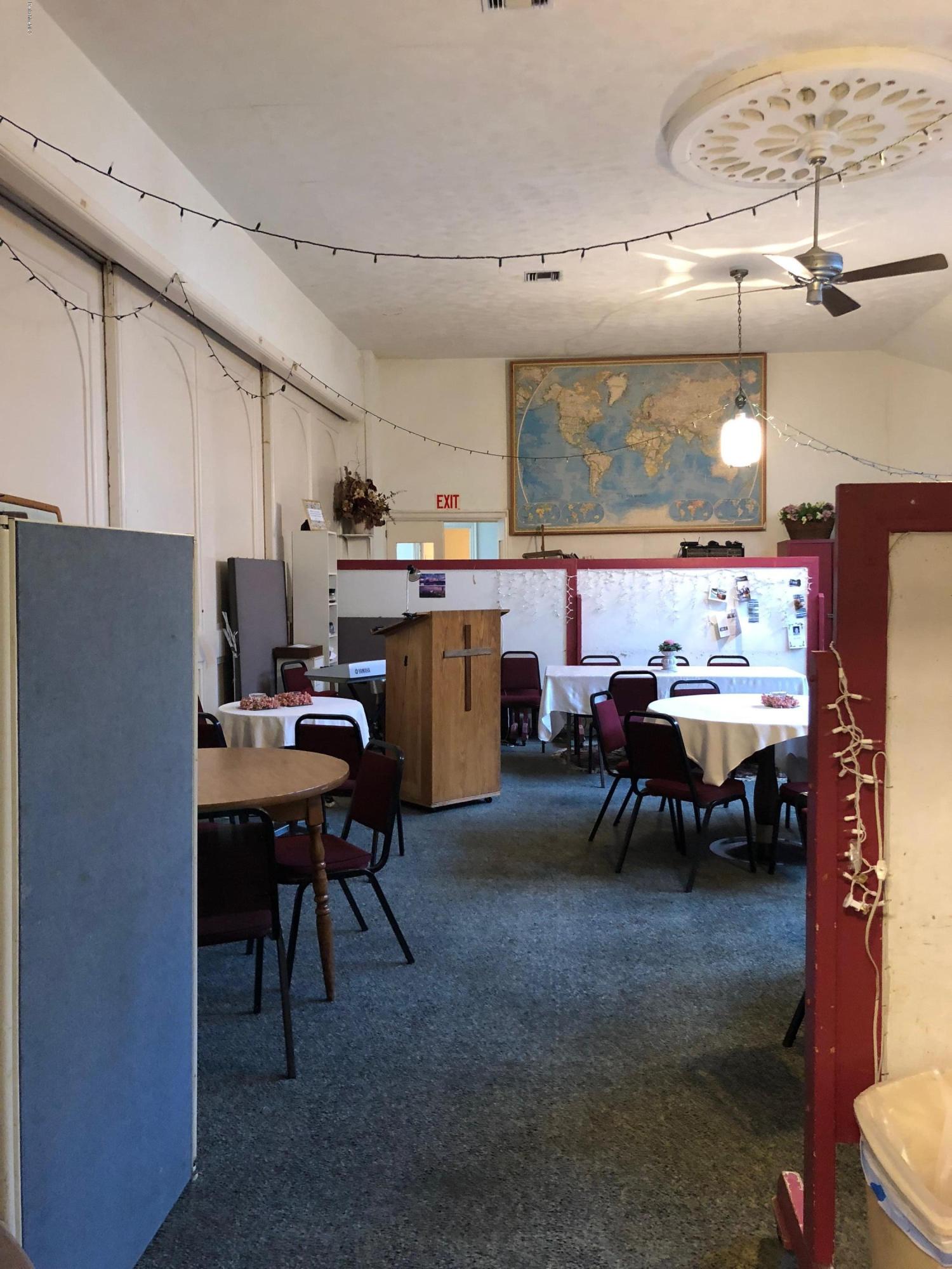 160 High Street Lee, MA 01238 - Photo 5 of 16 a view of a big room with dining table chairs and a kitchen
