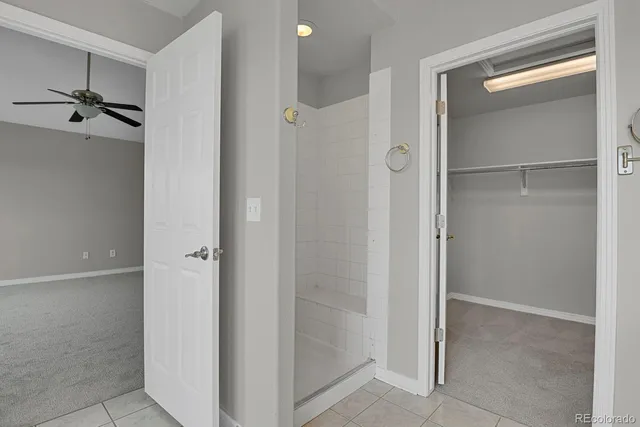 a view of a walk in closet and entryway