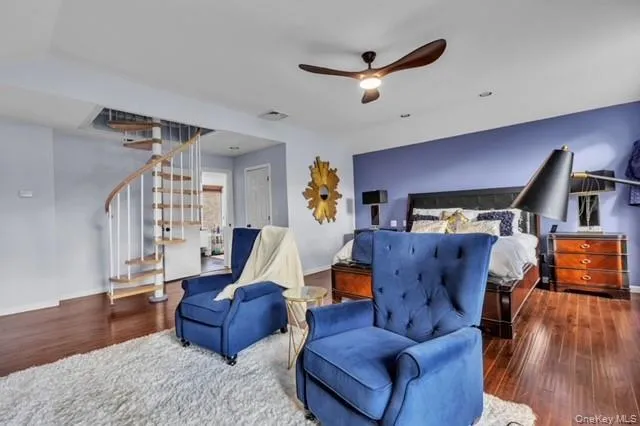 a bed room with furniture and a window