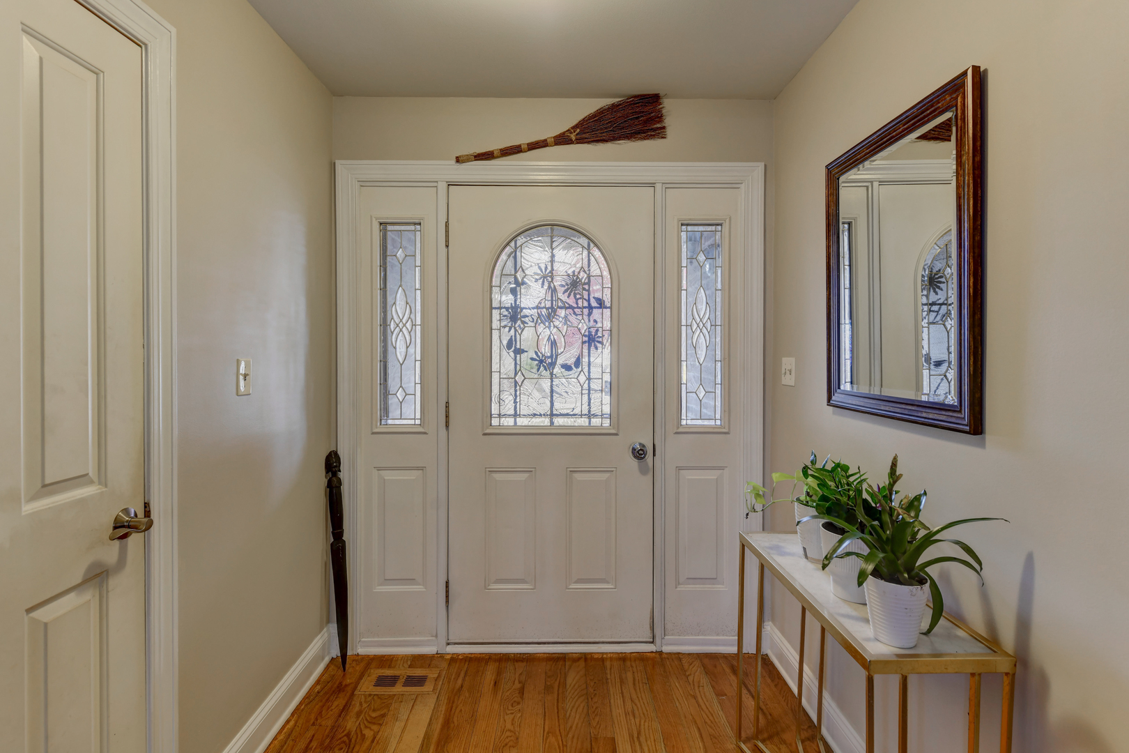 4999 Hawk Lane Monee, IL 60449 - Photo 2 of 20 a view of an entryway door with wooden floor