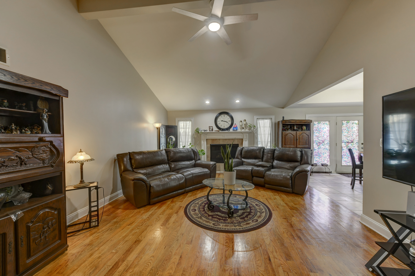 4999 Hawk Lane Monee, IL 60449 - Photo 3 of 20 a living room with furniture and a fireplace