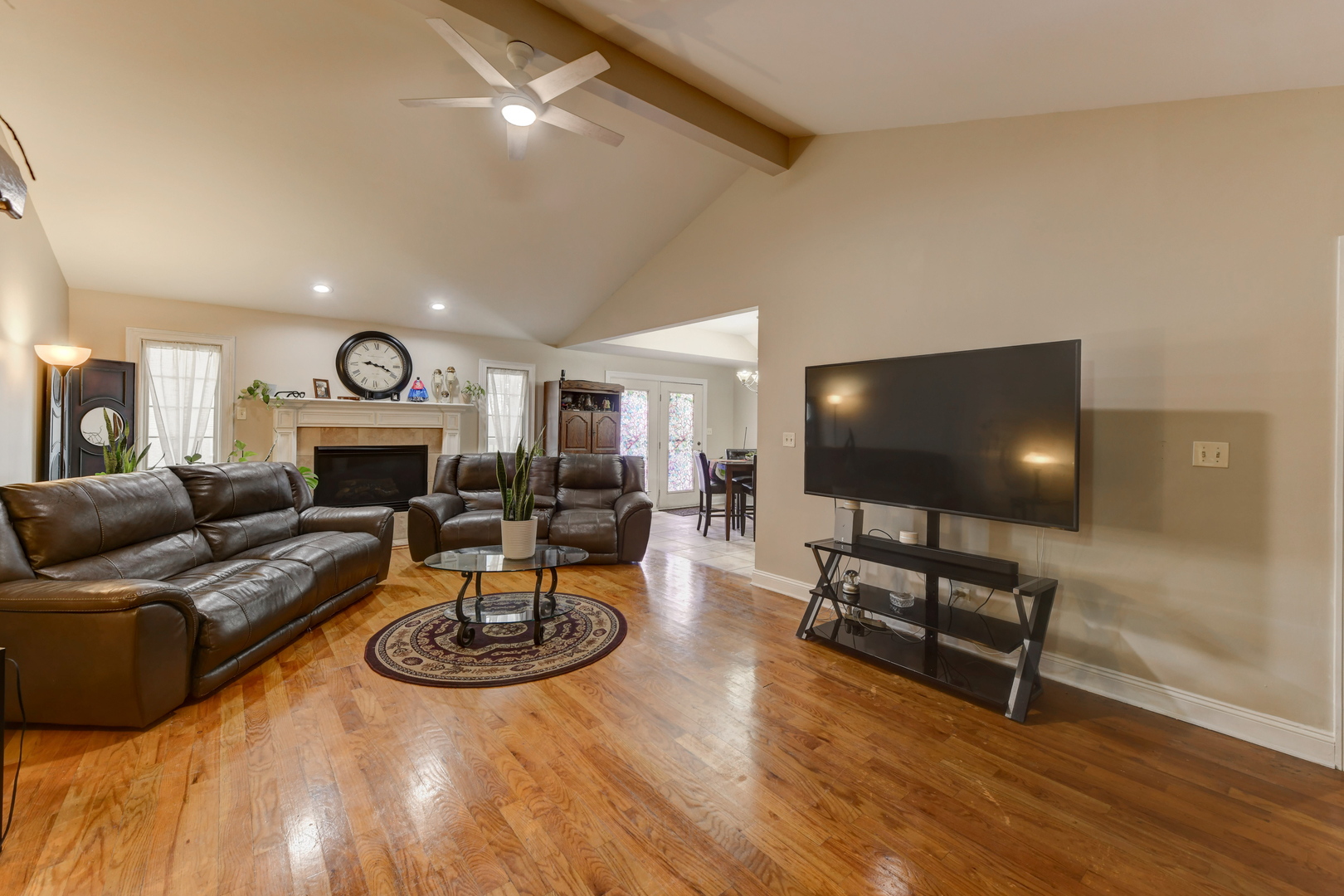 4999 Hawk Lane Monee, IL 60449 - Photo 4 of 20 a living room with furniture and a wooden floor
