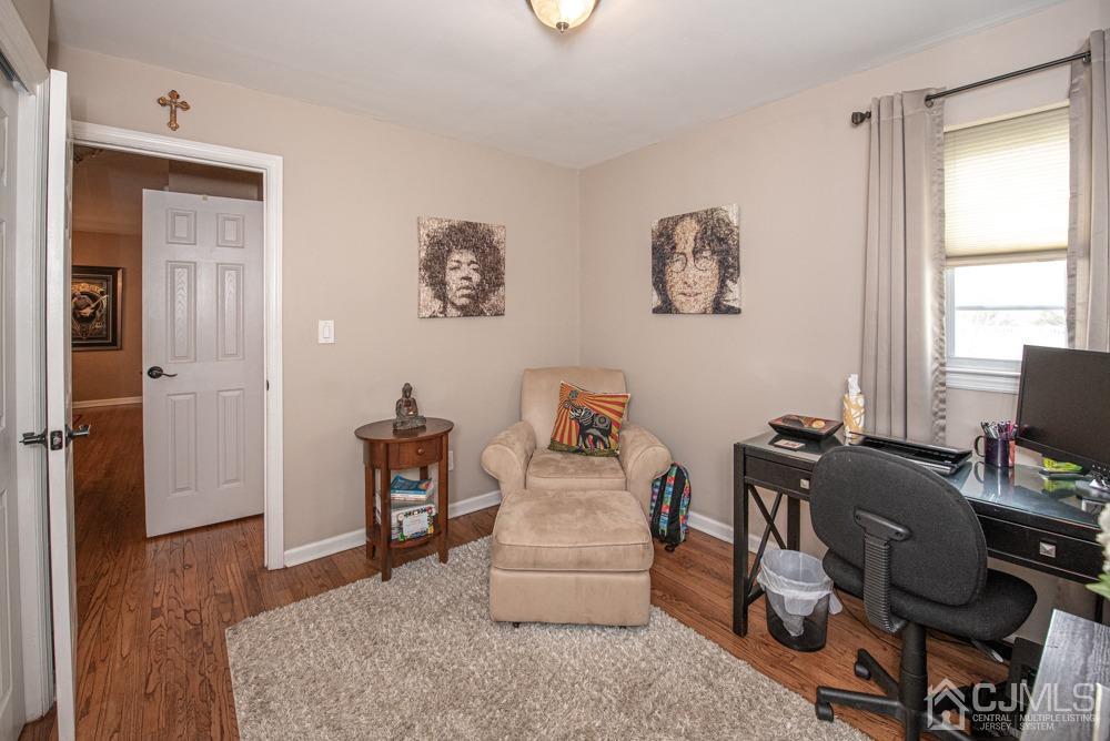 18 Richard Road East Brunswick, NJ 08816 - Photo 17 of 40 a room with furniture and a window