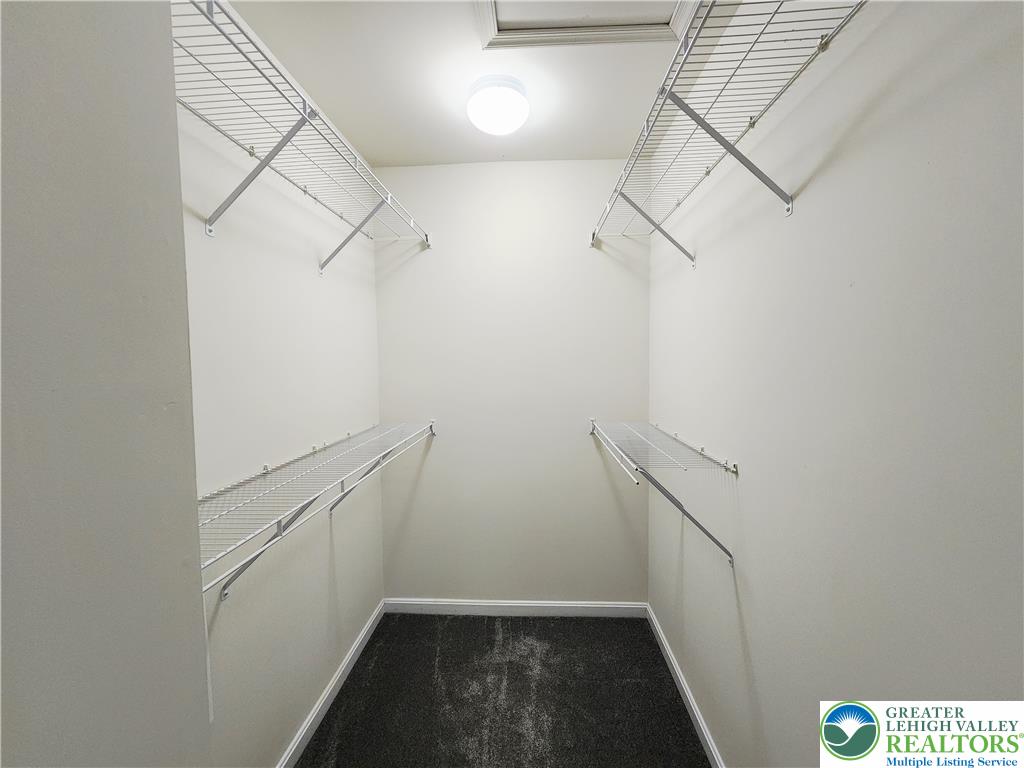 8513 Gateway Road Breinigsville, PA 18031 - Photo 27 of 45 Walk-in closet offers ample storage with convenient wire shelving on all sides.