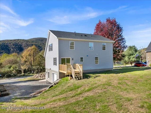 a front view of house with yard