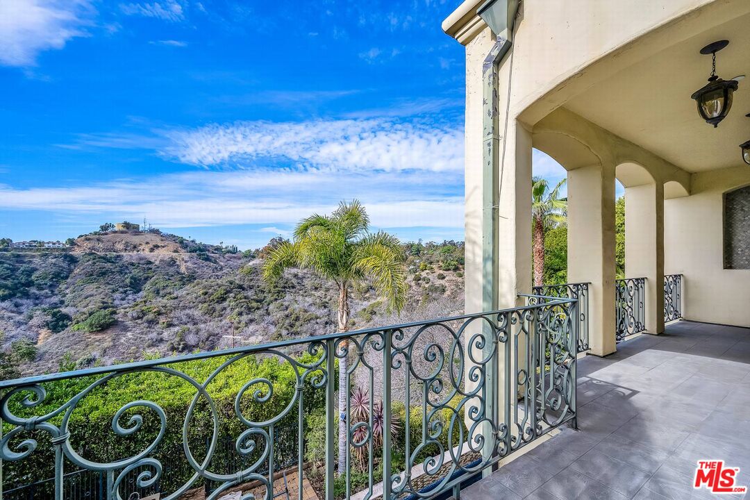 3110 Benedict Canyon Drive Beverly Hills, CA 90210 - Photo 37 of 70 a view of a street with an ocean view