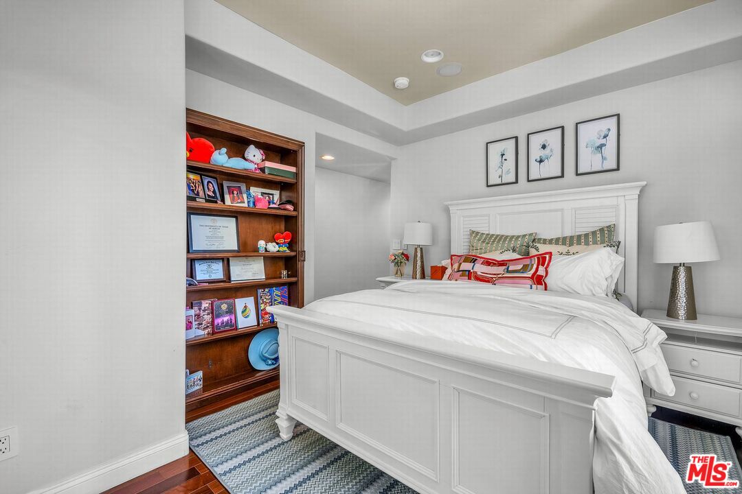 3110 Benedict Canyon Drive Beverly Hills, CA 90210 - Photo 41 of 70 a bed room with a bed and a closet