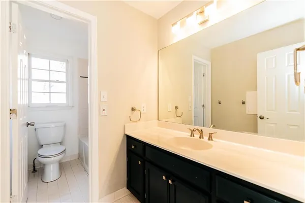 a view of balcony with furniture and wooden floor