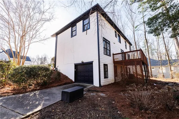 a view of staircase with white walls