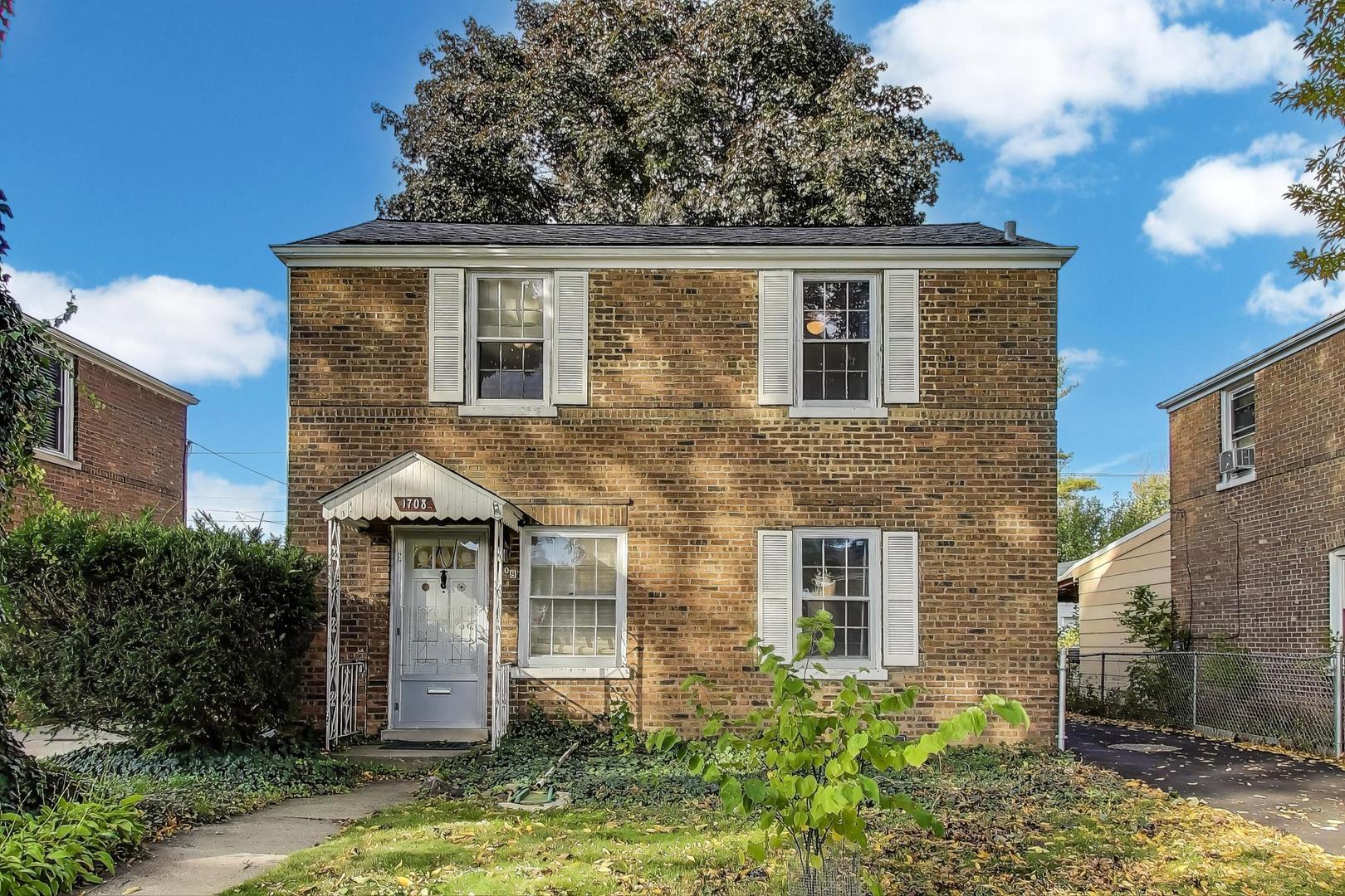 front view of house with a yard