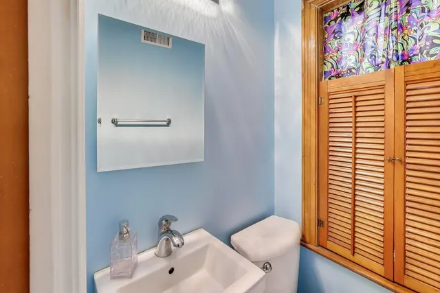a bathroom with a sink and a toilet