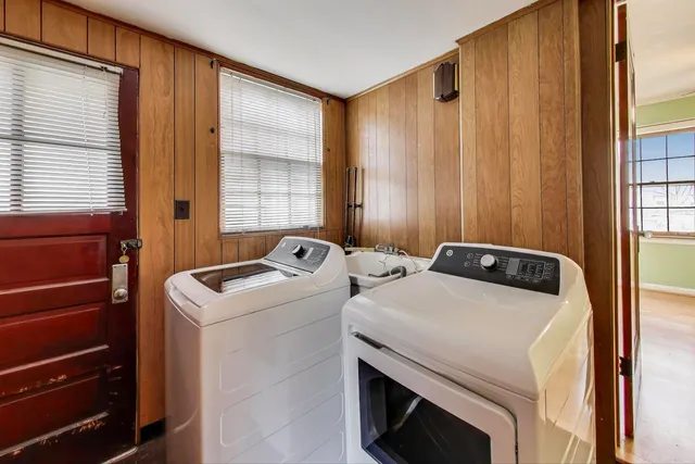 a utility room with dryer and washer