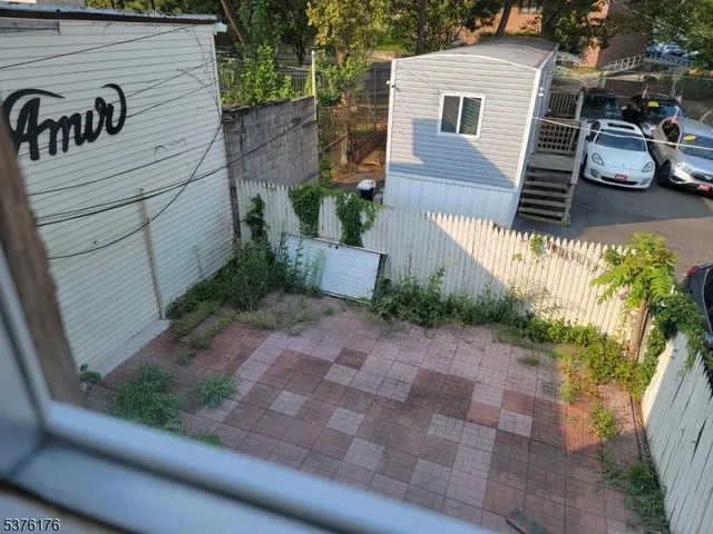 a view of a back yard of the house