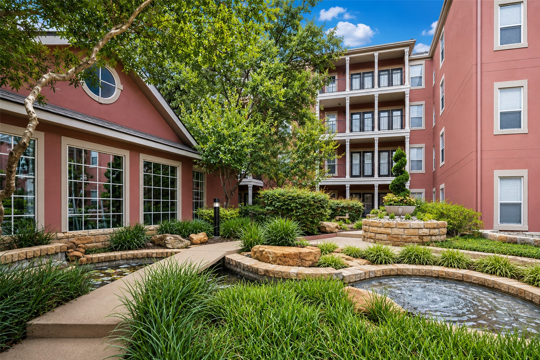 2400 McCue Road, Unit 401 Houston, TX 77056 - Photo 2 of 47 Enjoy this lovely water feature in the courtyard.