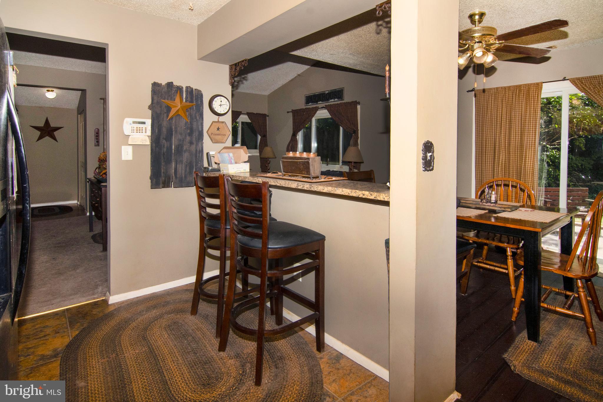 15 Dover Drive Lindenwold, NJ 08021 - Photo 14 of 24 a view of a dining room with furniture and a chandelier