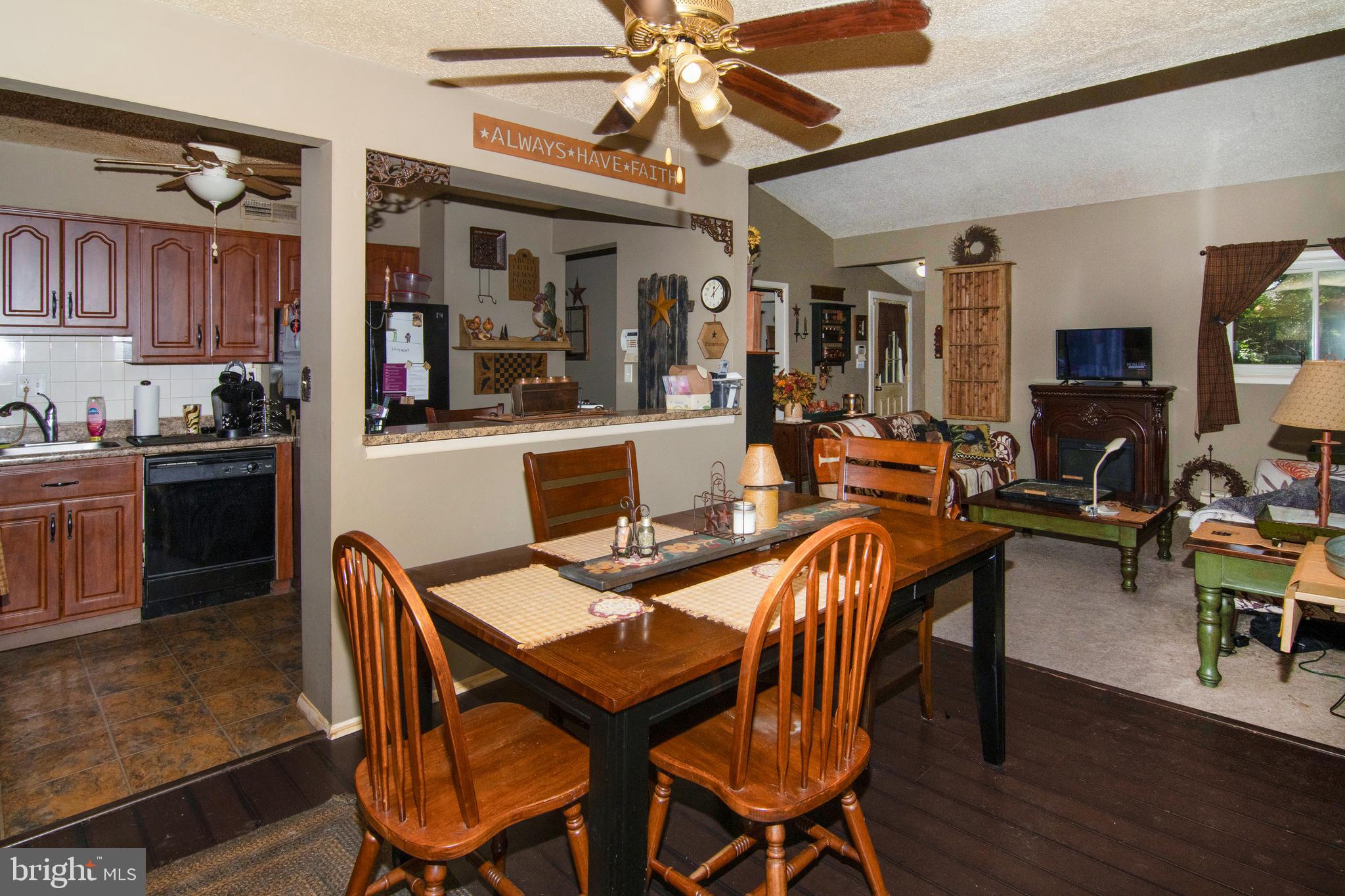 15 Dover Drive Lindenwold, NJ 08021 - Photo 10 of 24 a view of a dining room with furniture and wooden floor