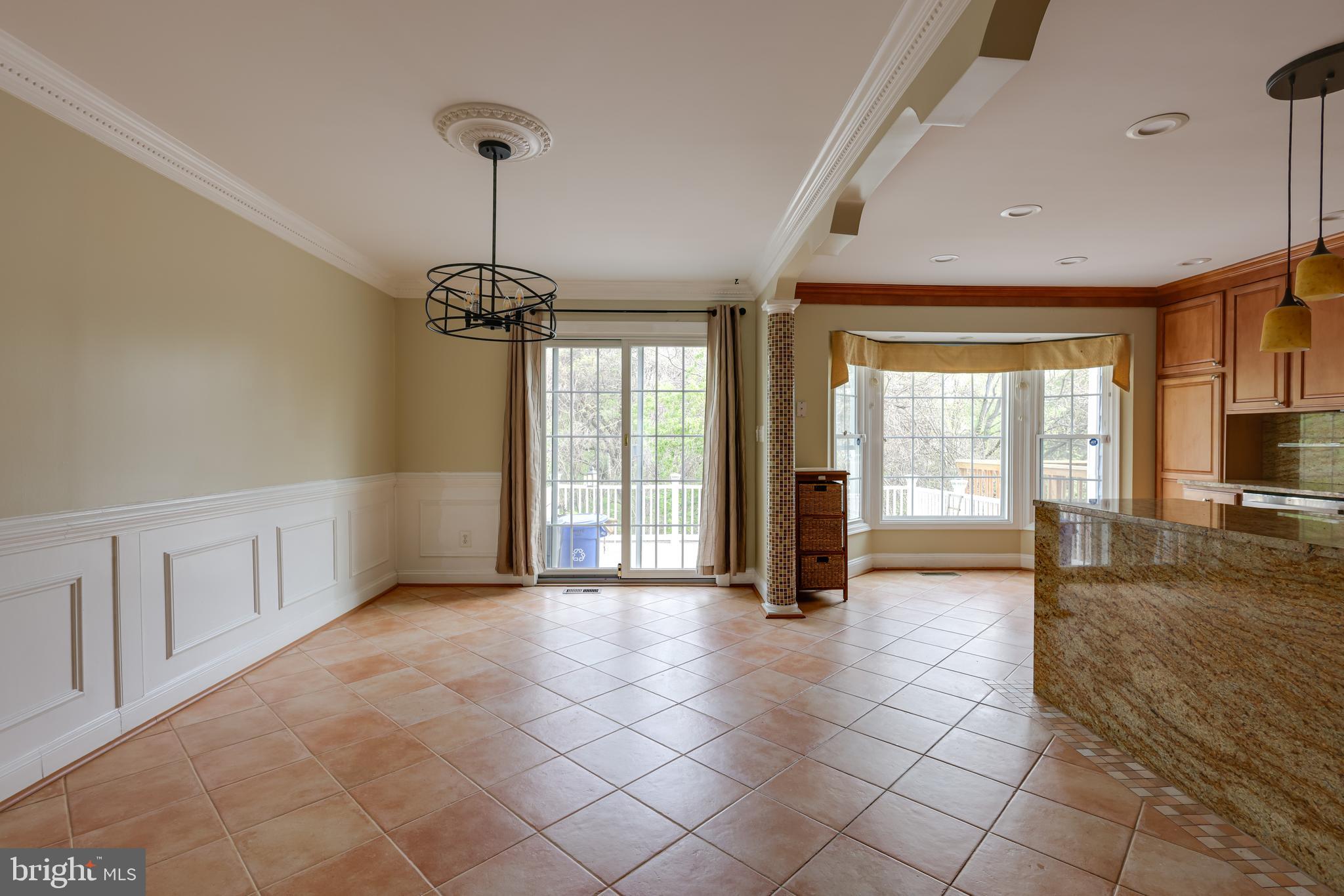 43440 Postrail Square Ashburn, VA 20147 - Photo 11 of 44 a view of an entryway with wooden floor and windows