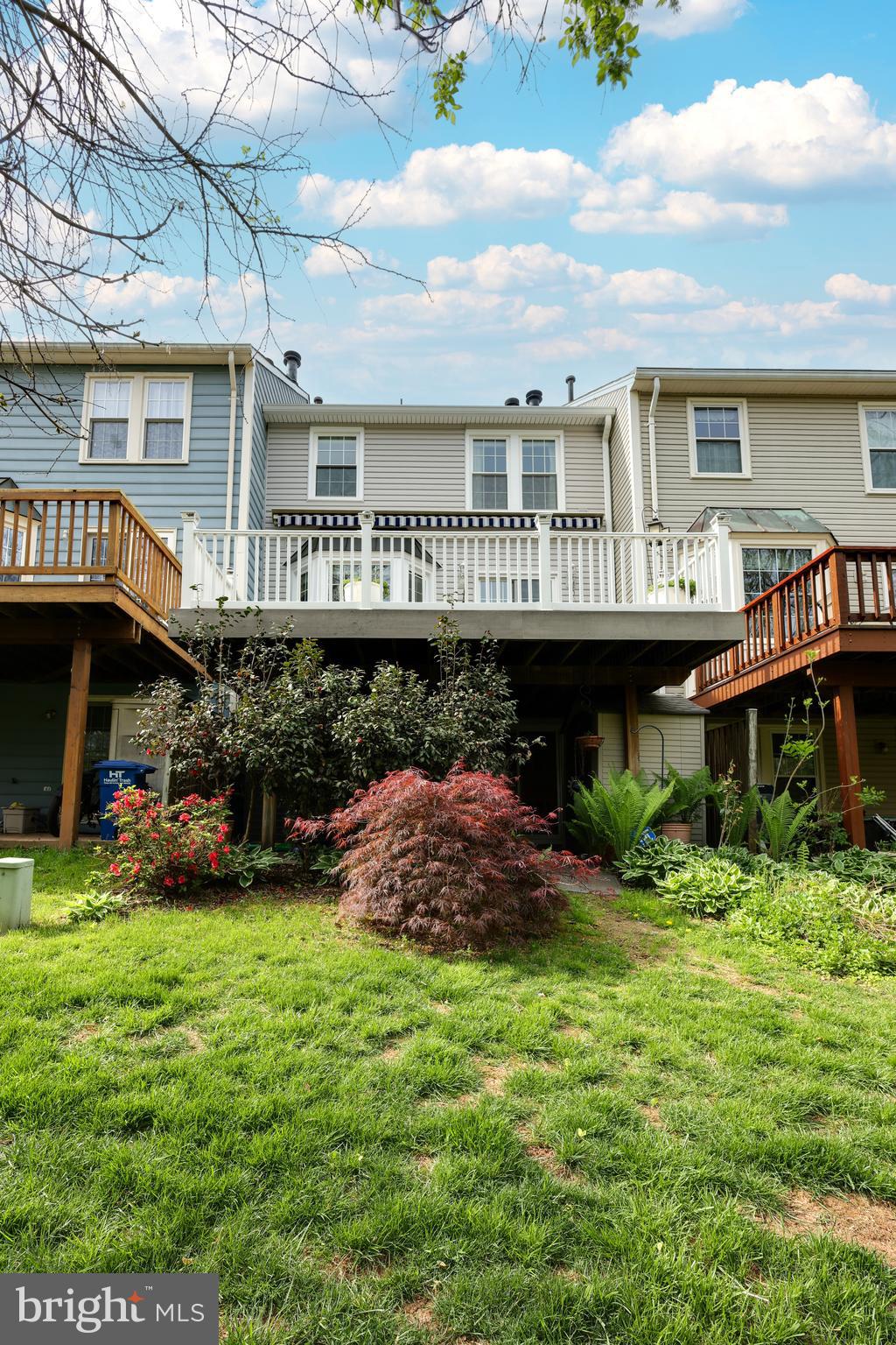 43440 Postrail Square Ashburn, VA 20147 - Photo 39 of 44 a view of a house with a yard and sitting area