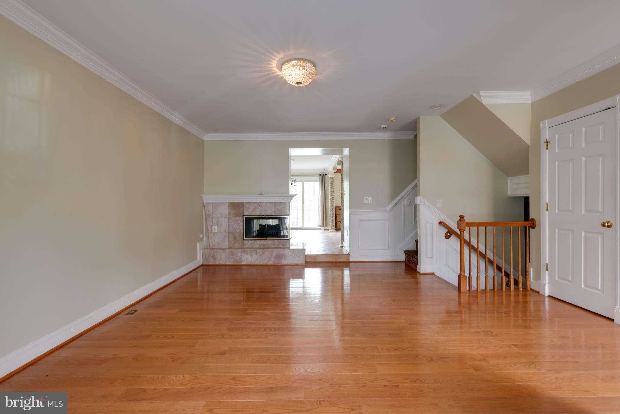 43440 Postrail Square Ashburn, VA 20147 - Photo 4 of 44 a view of empty room with wooden floor