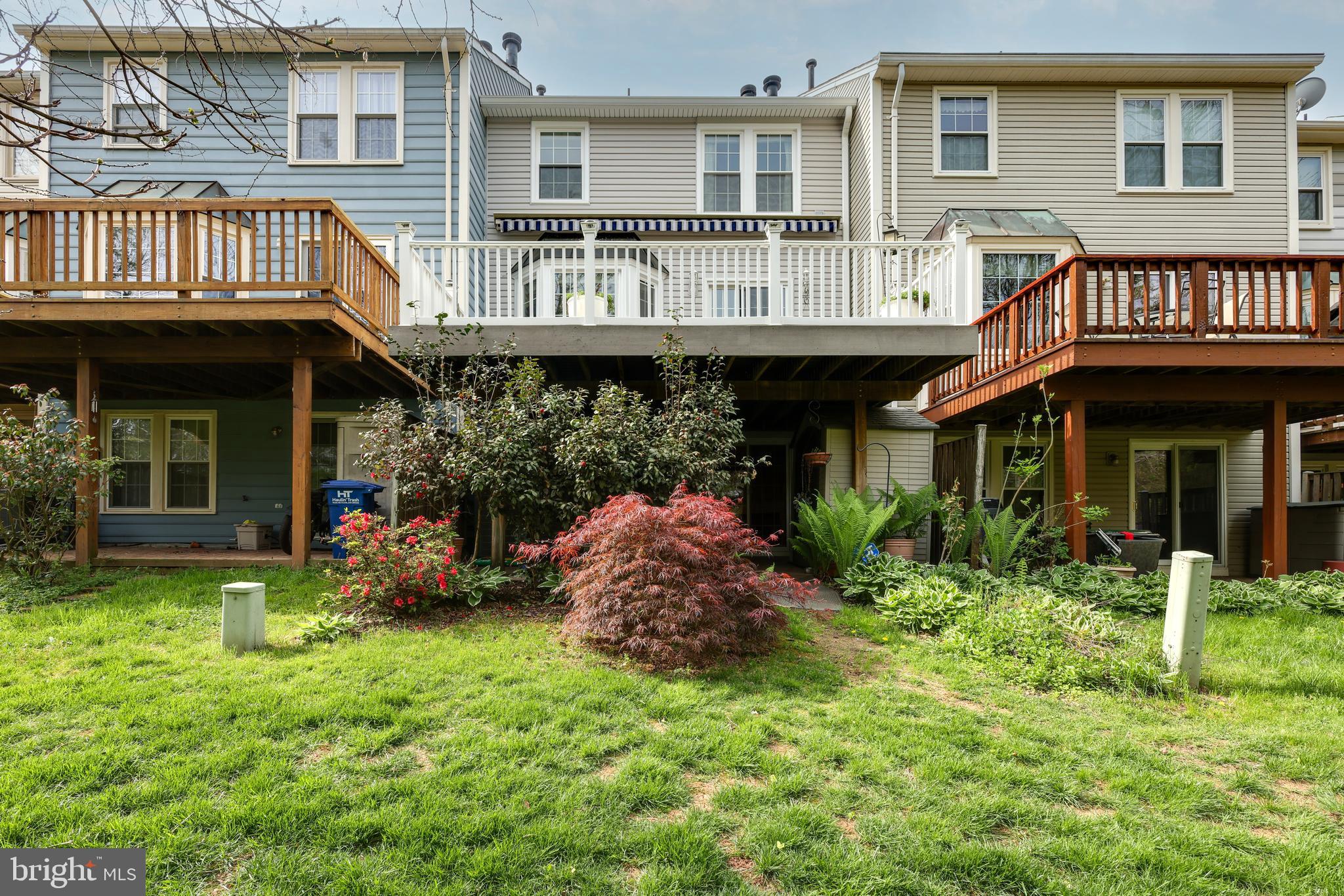 43440 Postrail Square Ashburn, VA 20147 - Photo 42 of 44 a front view of a house with yard and porch