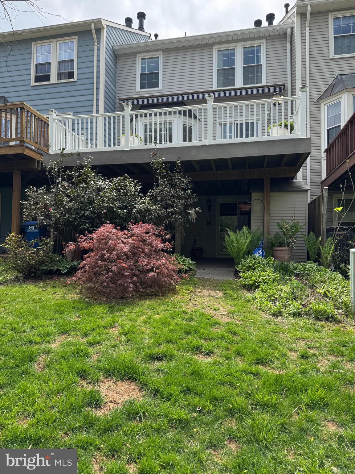43440 Postrail Square Ashburn, VA 20147 - Photo 43 of 44 a view of a house with backyard and sitting area
