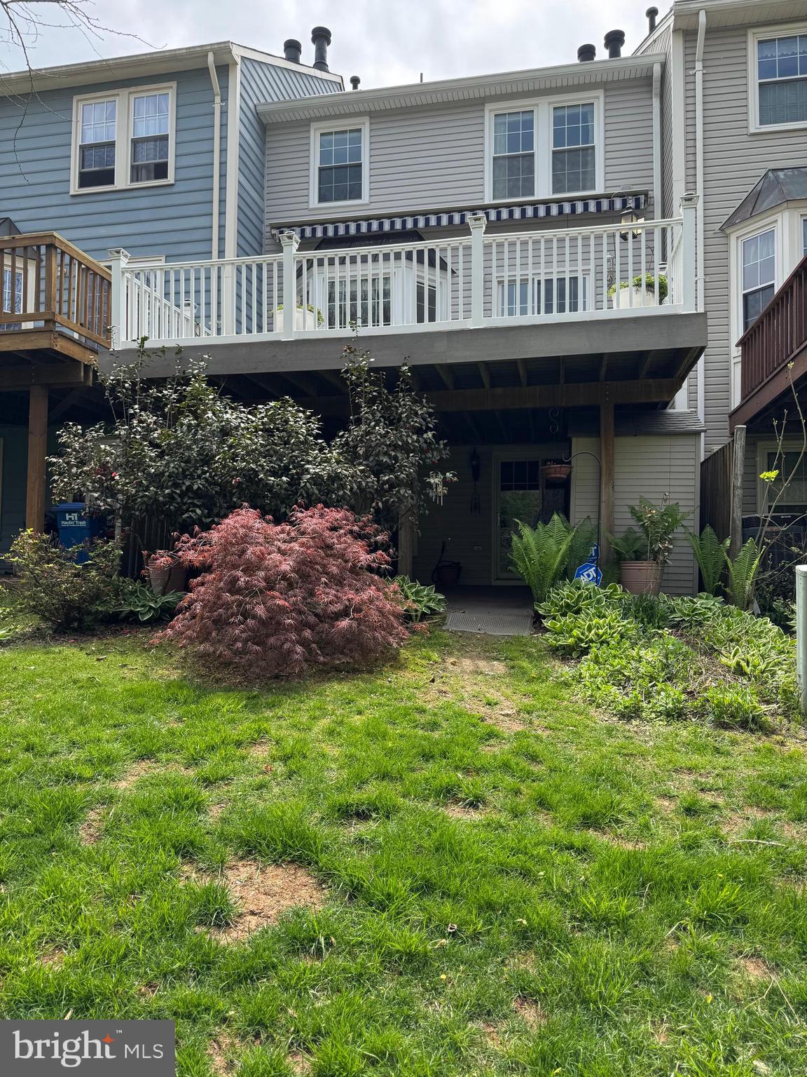 43440 Postrail Square Ashburn, VA 20147 - Photo 44 of 44 a view of a house with backyard and sitting area