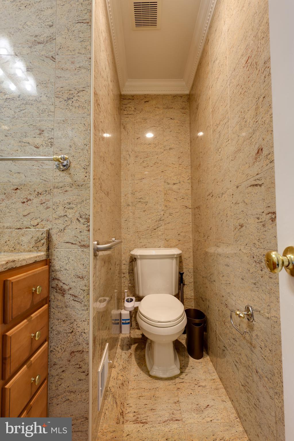 43440 Postrail Square Ashburn, VA 20147 - Photo 5 of 44 a bathroom with a toilet and a shower