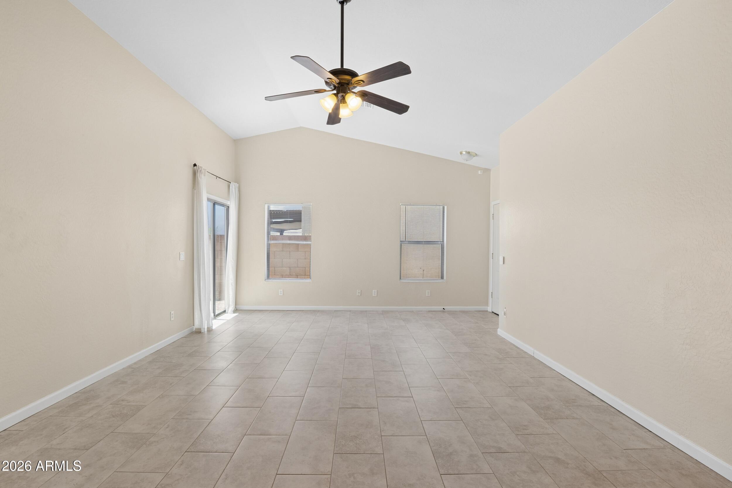 24025 West Pecan Road Buckeye, AZ 85326 - Photo 9 of 42 Looking from Kitchen into Living Area