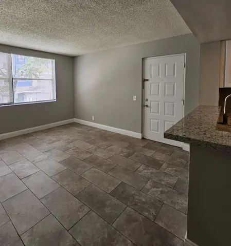 a view of livingroom with workspace
