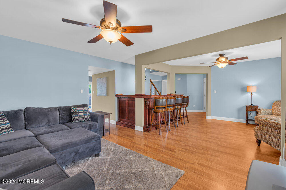 7 Andrew Street Howell, NJ 07731 - Photo 19 of 57 a living room with furniture and a dining table