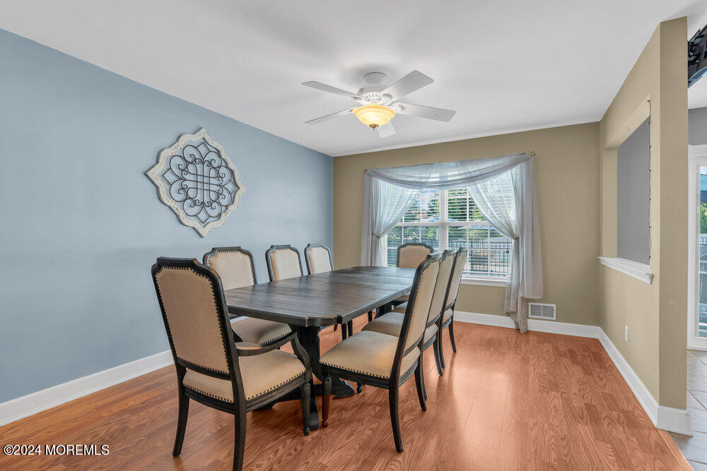 7 Andrew Street Howell, NJ 07731 - Photo 20 of 57 a view of a dining room with furniture window and wooden floor